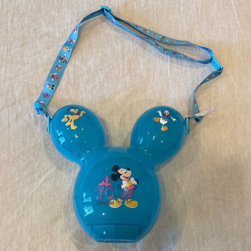 Disneyland 70th anniversary popcorn bucket with lights and strap